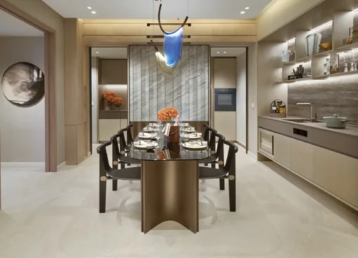 Union Square Residences, for illustration only: dining area beside the kitchen in a four-bedroom premium home, with a stone feature wall