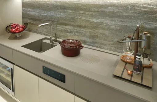 Union Square Residences, for illustration only: kitchen counter in engineered stone with an induction hob and integrated sink