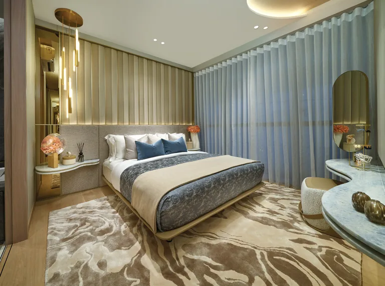 Union Square Residences, for illustration only: master bedroom with a patterned rug, upholstered bedhead and full-height curtains